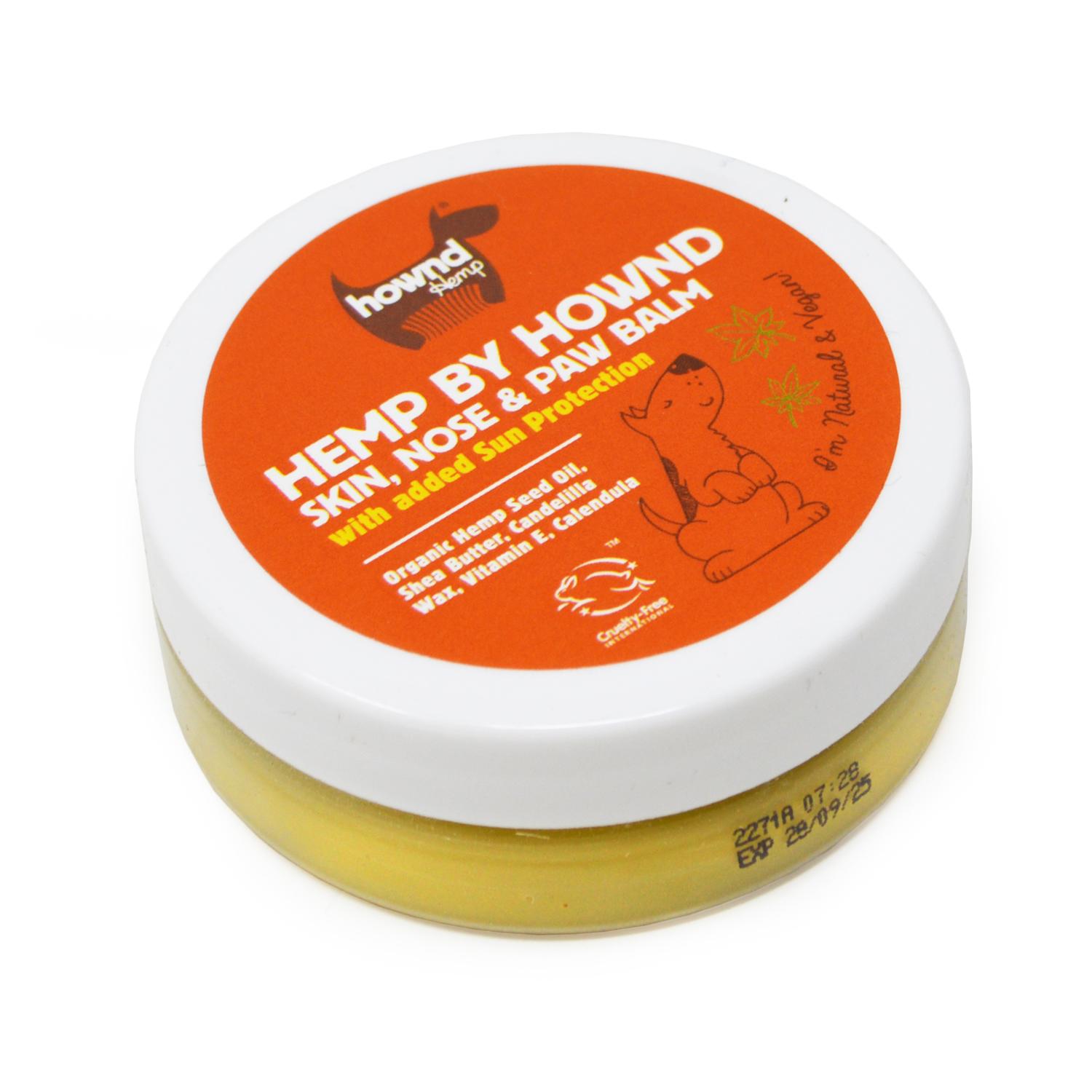 Angled view of a tub of Hownd Hemp Cruelty Free Paw Balm For Dogs