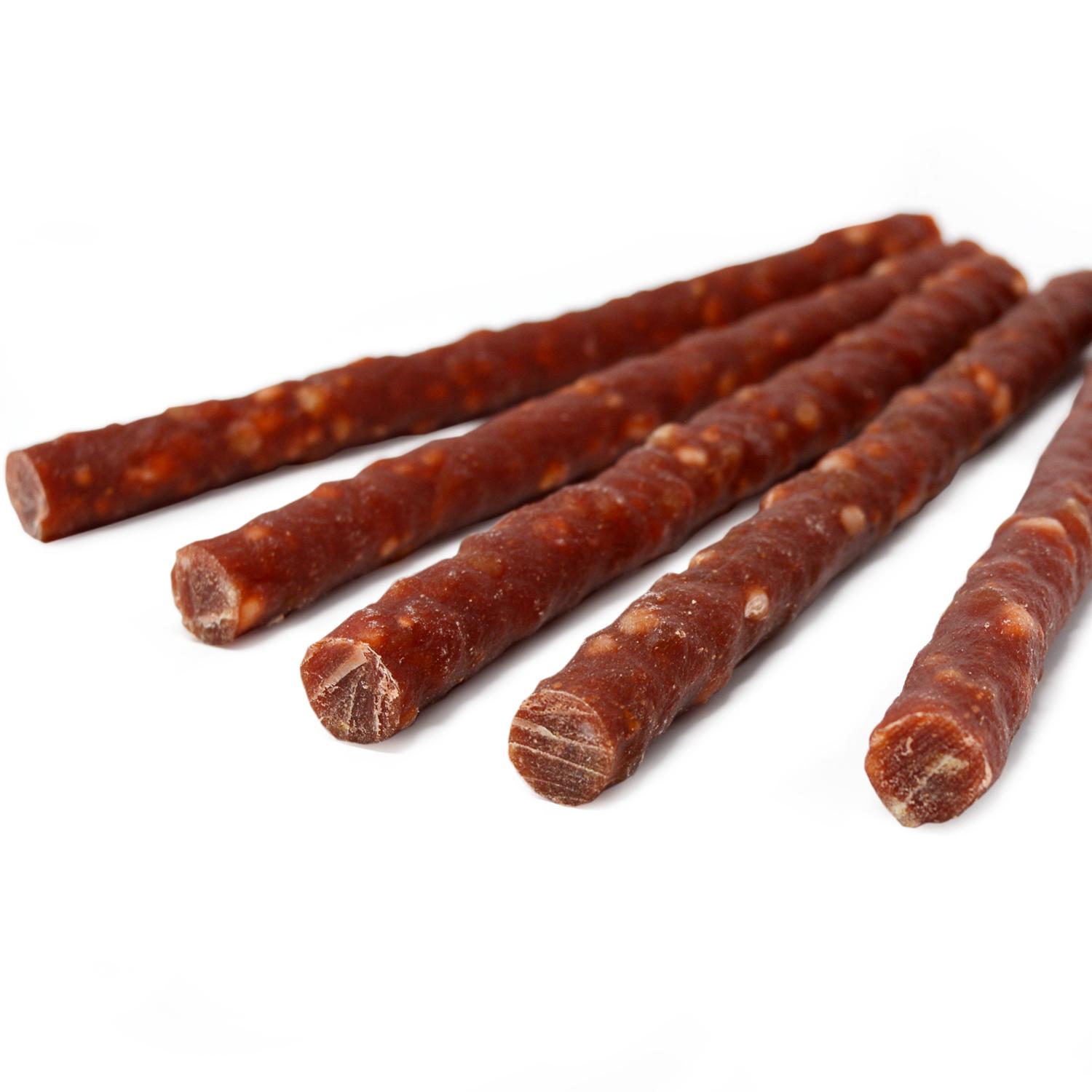 Close up of five large Antos Farm Roll Dog Chews