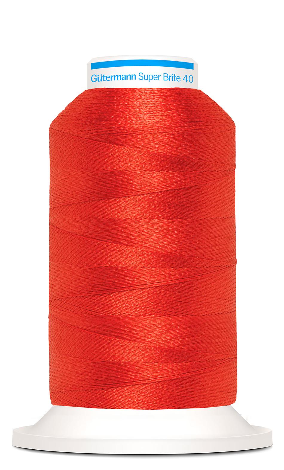 A bright red Gutermann Superbrite Machine Embroidery thread