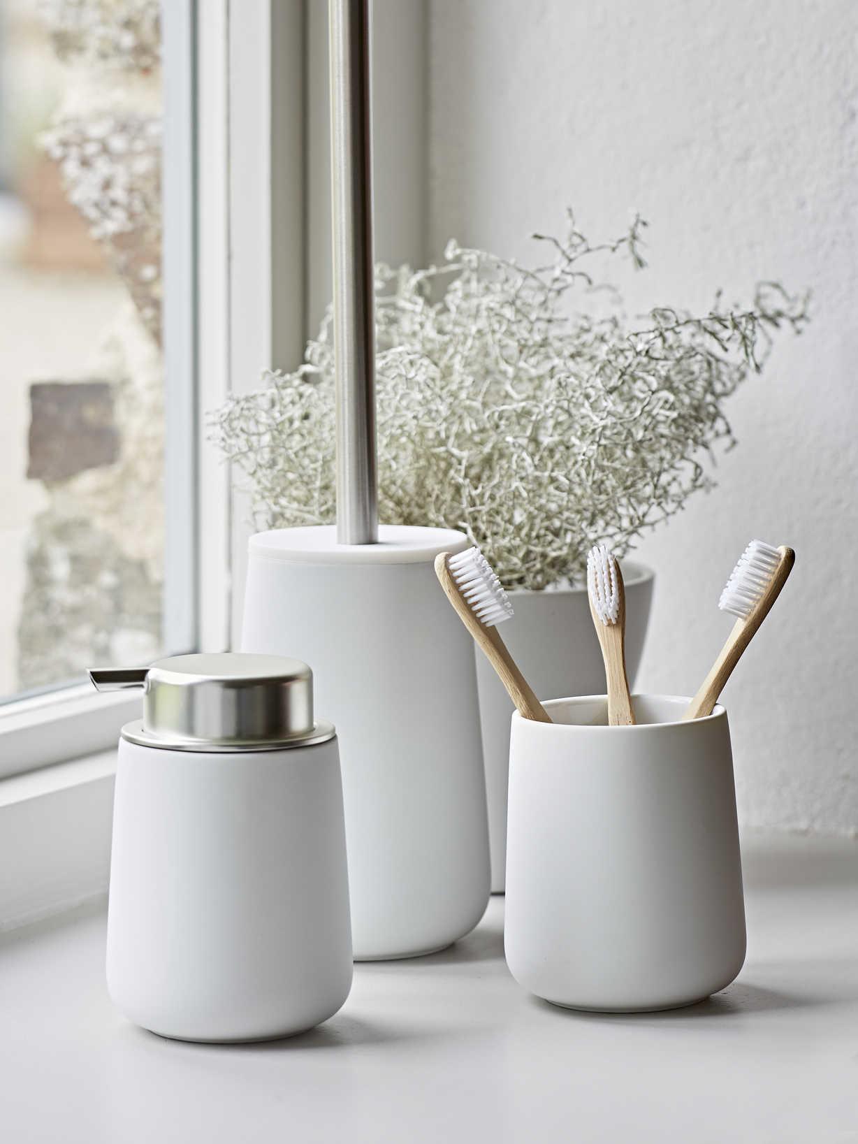 White porcelain shop toilet brush
