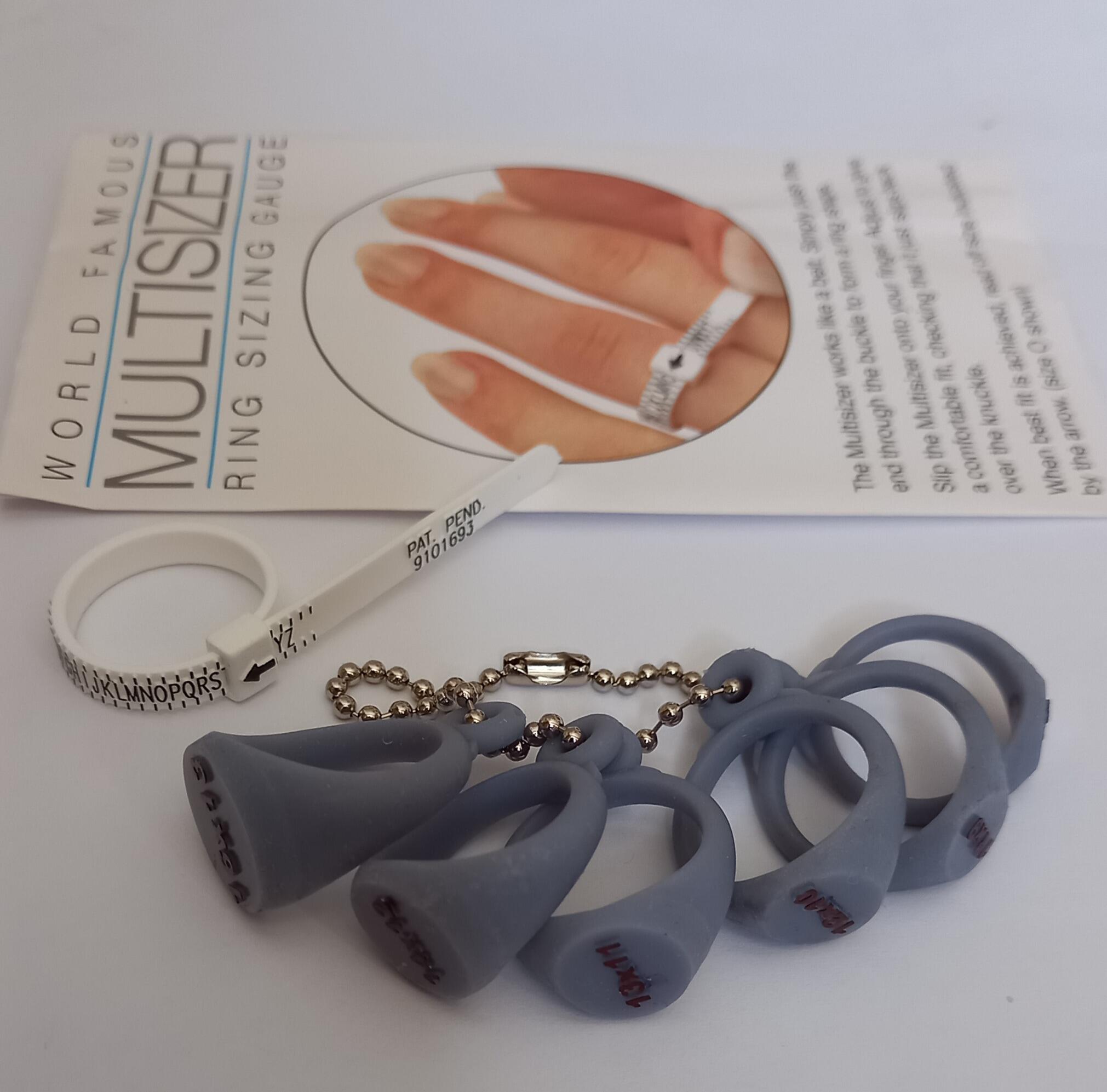 a set of plastic oxford oval signet rings guage different head sizes