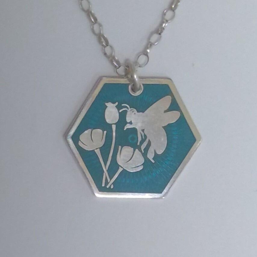 bee and poppy pendant