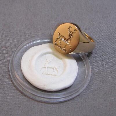deep reverse crest stag gold signet ring