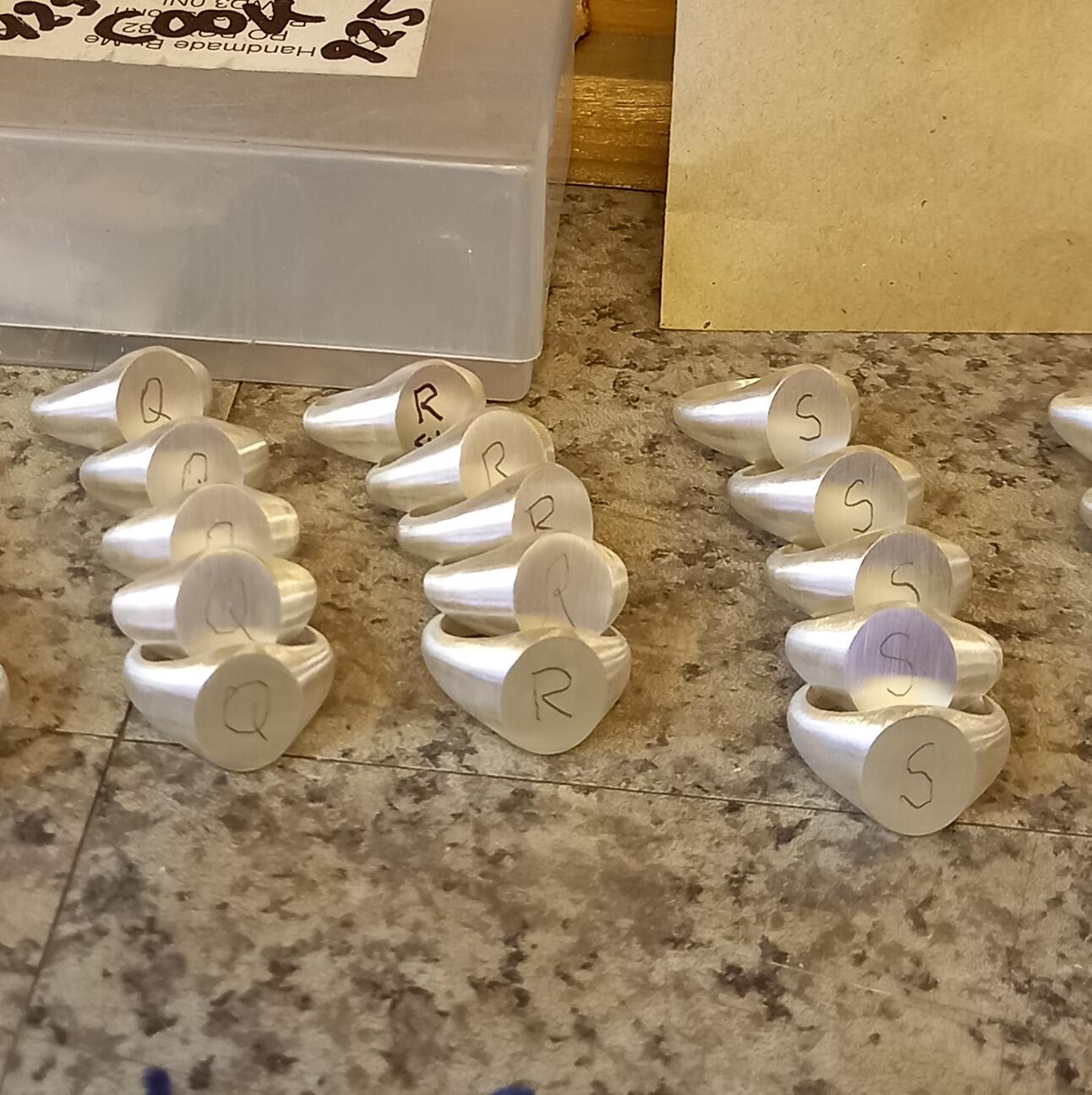 assorted sterling silver signet rings