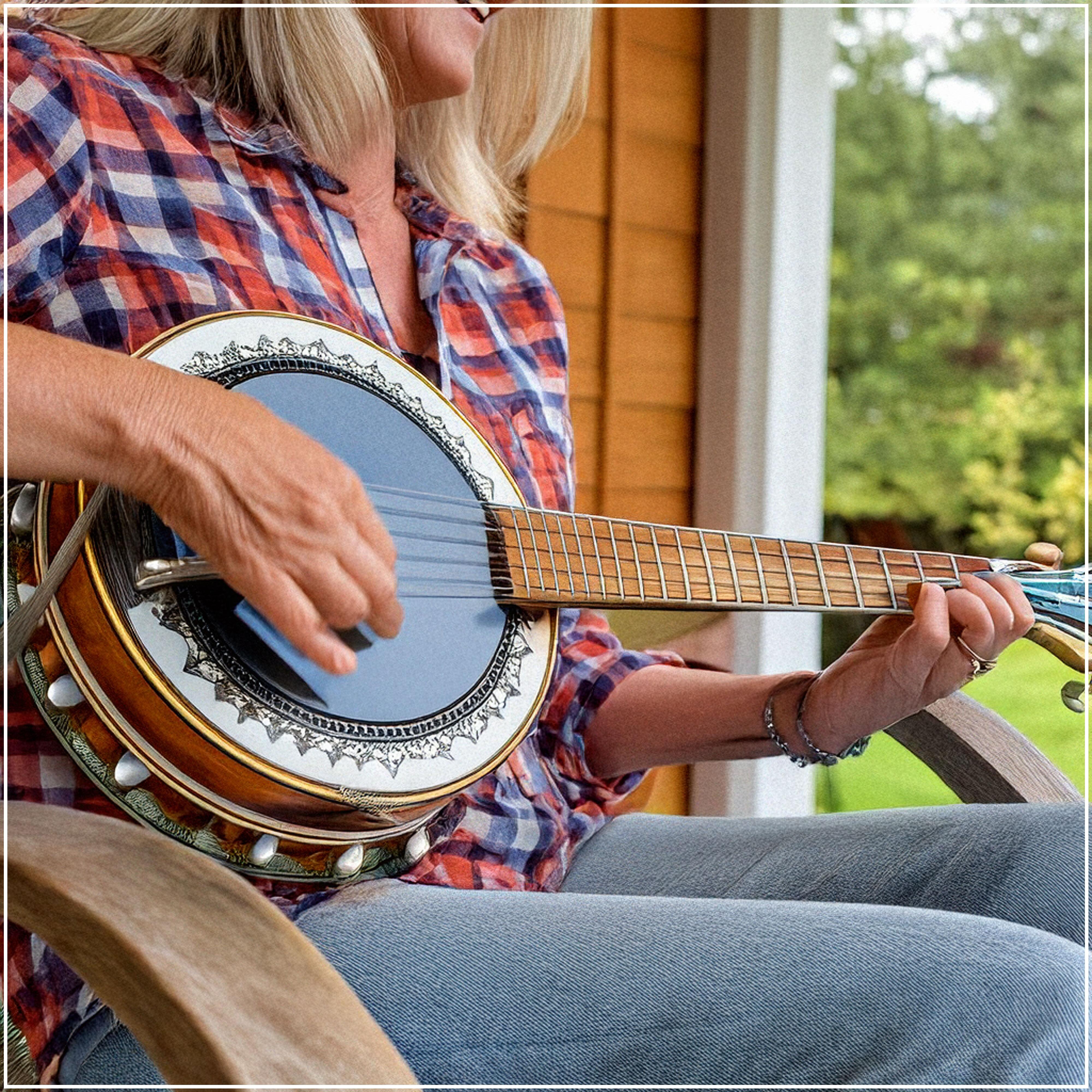 Lady sitting on the porch playing the banjo