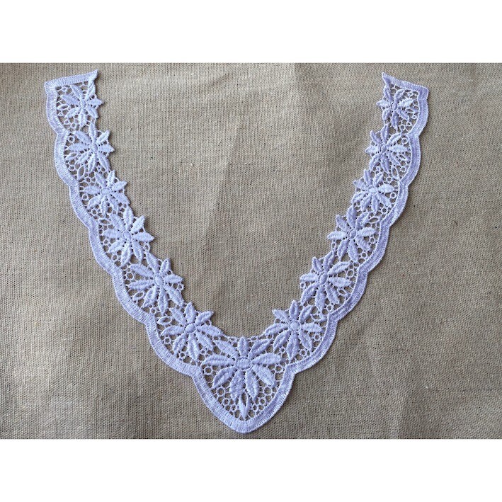 Fascinating white light weight guipure design sold by the yard