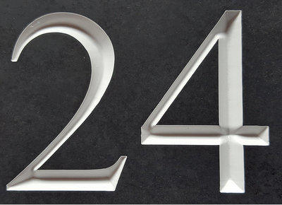 Slate house sign with v-carve engraved number 24 with a white inlay