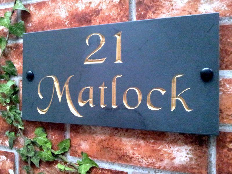 Slate name sign with gold inlay
