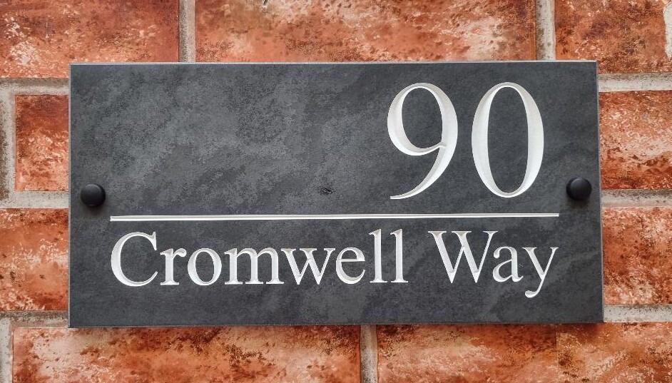 Slate house sign 300mm x 150mm displaying a larger number 90 with the road name below the dividing line