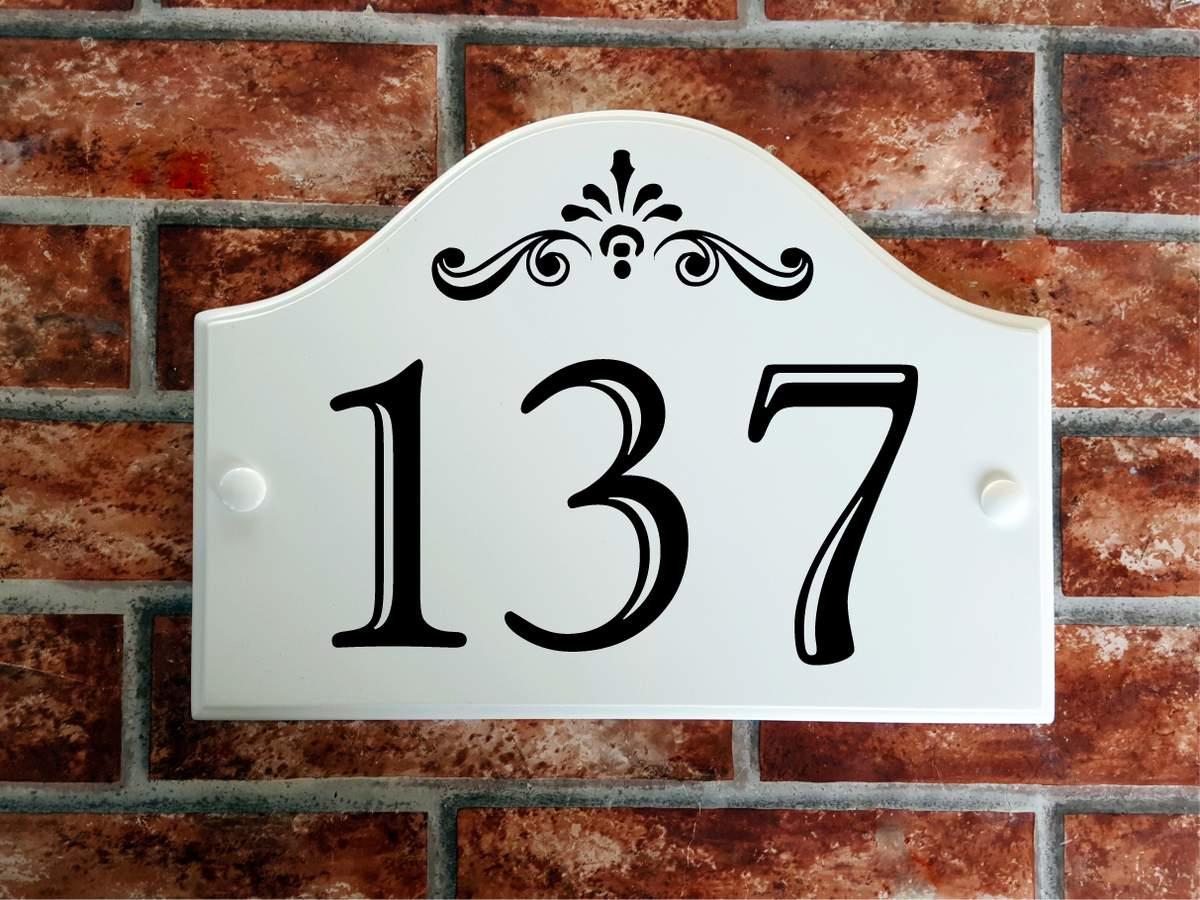 Bridge top house number plaque with large house numbers