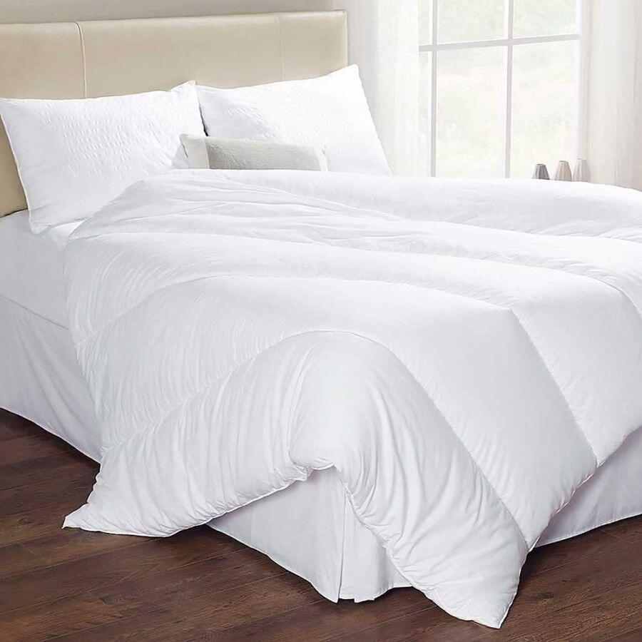 image of a bed with duvet