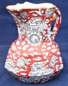 An antique Masons Ironstone China hydra handled octagonal jug transfer printed with the Chinese foo dog and cloud scroll pattern known as the Bandana pattern by collectors. Made by Ashworth brothers circa 1899.