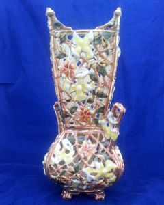 An antique Zsolnay Pecs Square Reticulated Vase Shape 3695 decorated with orchids and flowers circa 1895 Austria Hungarian