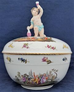 An antique Bacchus Handled dome lidded KPM Berlin Porcelain Punch Bowl with hand painted scenes based upon William Hogarth's satirical engravings and Deutsche Blumen, underglaze blue sceptre mark circa 1830 26.5 cm diameter 30.5 cm high.