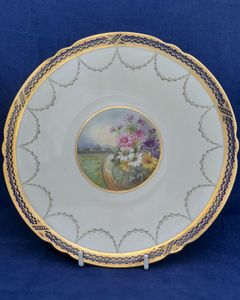 An antique Edwardian Spode Copeland's China porcelain cabinet plate painted central floral landscape pattern R2331 with daisy type flowers and topiary - gilded Bradford border registered design number 461740 antique circa 1905