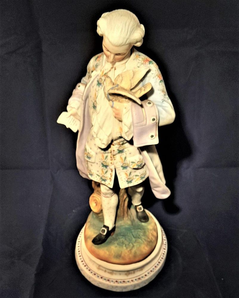 An antique French Old Paris enamelled bisque porcelain figurine young man with a dove on an oval faux marble base circa 1880 - 37 cm high - 2.58 Kg Probably Chantilly