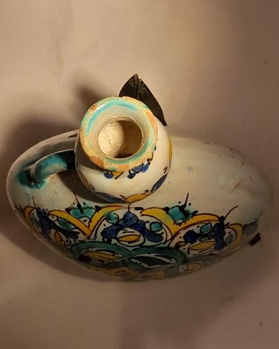 Moroccan tin glazed earthenware or faience pilgrim water flask antique 19th century hand painted with polychrome Arabesque foliate geometric pattern  727 grammes  9 inches long 6.5 inches wide  3 5/8 inches deep