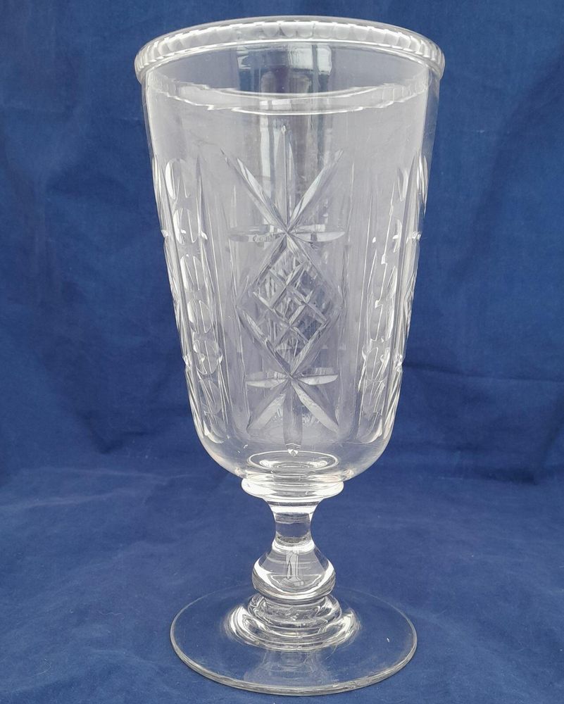 Antique Victorian Cut Glass Celery Vase with Folded Rim to a Bell Shaped bowl on a Baluster Stem and plain foot - circa 1870 21 cm high 10 cm diameter