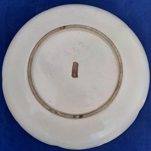 Underside or back view of the plate - Japanese Satsuma Pottery Low relief Moulded Plate Painted Immortals or Lucky Gods with Halos marked Satsuma & Shimazu mon - Antique Meiji circa 1900