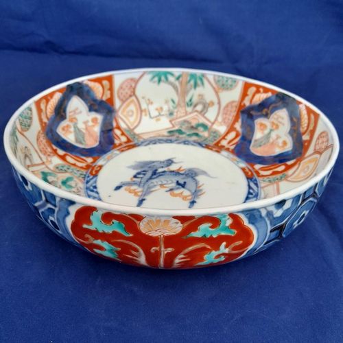 side on pattern image - Japanese Arita porcelain Imari pattern Bowl with Central Kirin & garden scenes - the base with double foot ring - antique late Edo period 19th C