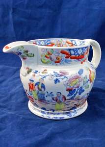 Antique Porcelain Jug Transfer Printed Chinoiserie Pattern Marked with Unusual Porcelain scroll circa 1825