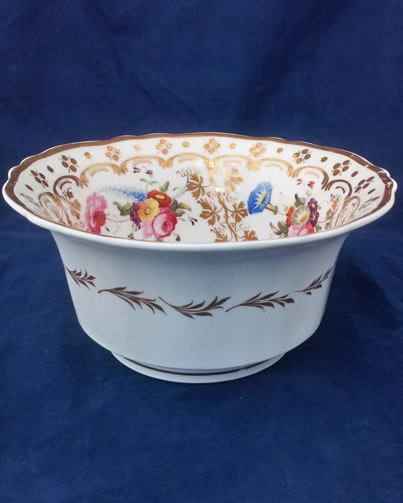Antique John and William Ridgway porcelain bowl or slop basin decorated with hand painted flower sprays fluted old English or Royal shape circa 1825.
