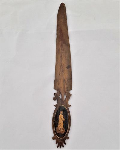 An antique Sorrento ware inlaid letter opener in olive wood with inlaid oval marquetry of a young  woman carrying a bowl Italian grand tour memento antique circa 1880