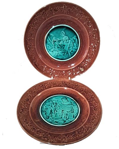 Pair of antique majolica two tone pottery plates relief moulded scenes - Purple & Turquoise Glaze - circa 1890 - boys to market with game  - donkey & chickens being fed by children -  9 inches diameter