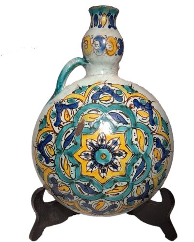 Moroccan tin glazed earthenware or faience pilgrim water flask antique 19th century hand painted with polychrome Arabesque foliate geometric pattern  727 grammes  9 inches long 6.5 inches wide  3 5/8 inches deep