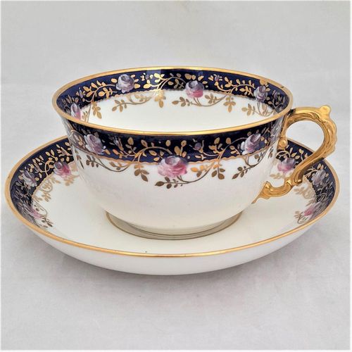 main image - Antique porcelain tea cup & saucer hand painted blue rim & swagged pink roses by W. Lambert 1915 - Larcombe King St Derby on a Bishop & Stonier Blank