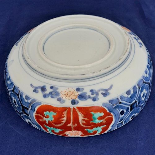 Side on underside view of the base - Japanese Arita porcelain Imari pattern Bowl with Central Kirin & garden scenes - the base with double foot ring - antique late Edo period 19th C