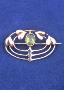Antique Murrle Bennett 9ct Gold Peridot Brooch Arts and Crafts Archibald Knox circa 1900