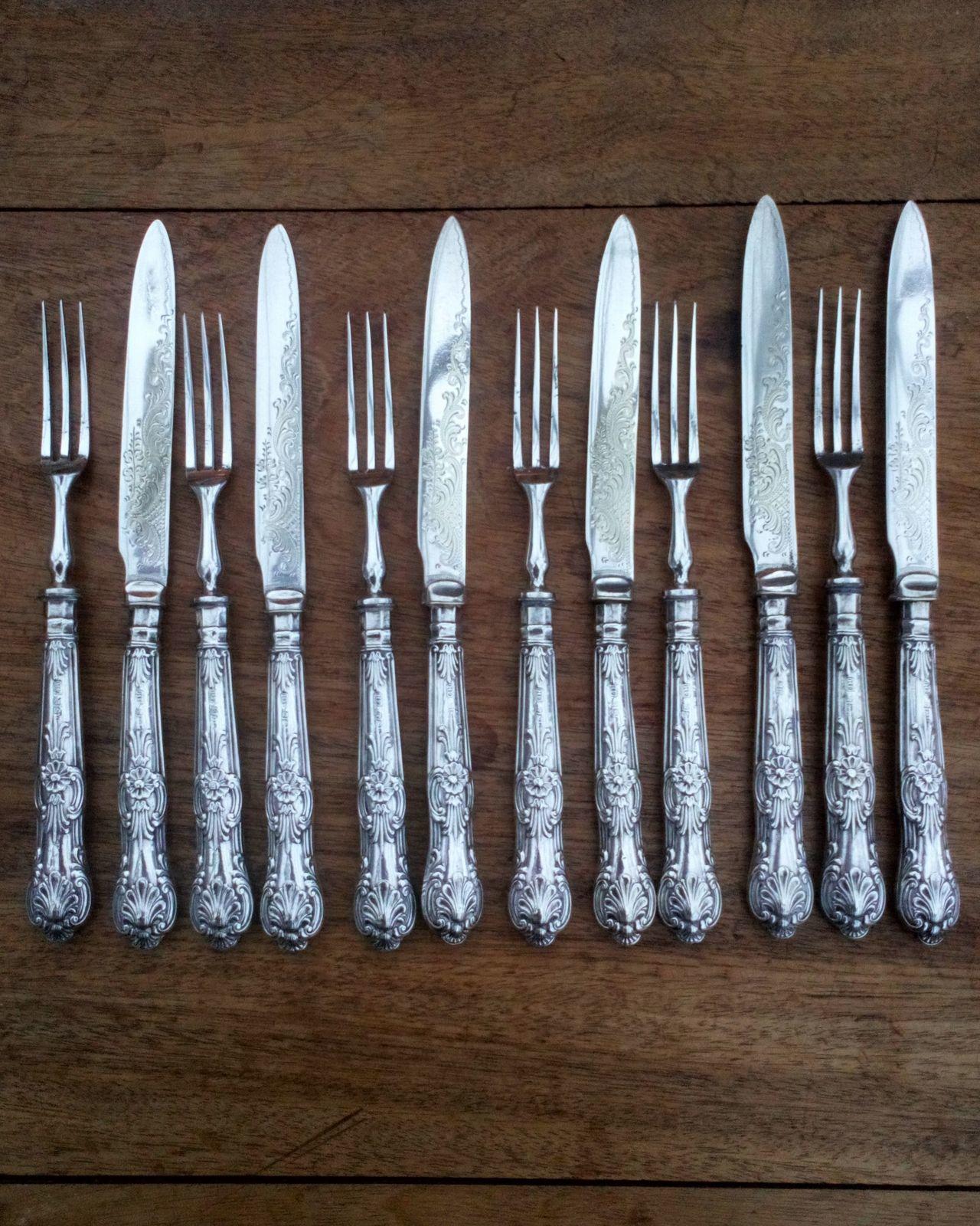 Antique Sterling silver handled dessert cutlery set for six place settings with Queens pattern handles and bright cut EPNS knife blades made by Harrison Fisher and co of Sheffield 12 pieces hallmarked 925 sterling silver and date letter i for 1901.