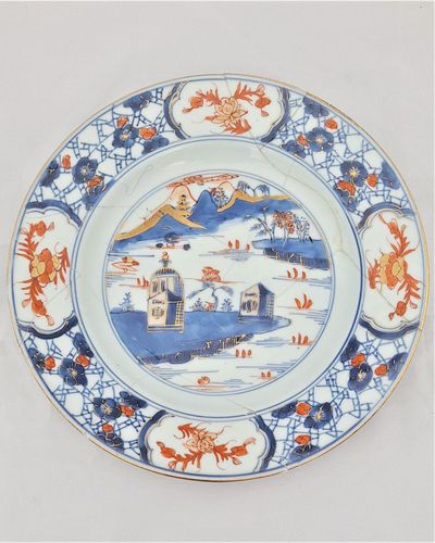 An antique Chinese Kangxi Porcelain Plate Painted European Style Buildings circa 1720 As found  twelve pieces glued back together.