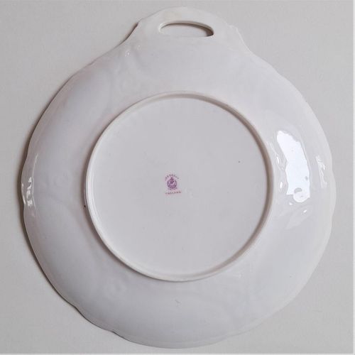 Underside of a cake plate