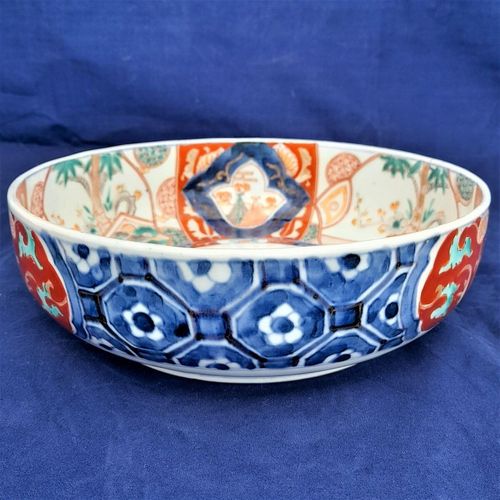 left side kikko  - Japanese Arita porcelain Imari pattern Bowl with Central Kirin & garden scenes - the base with double foot ring - antique late Edo period 19th C