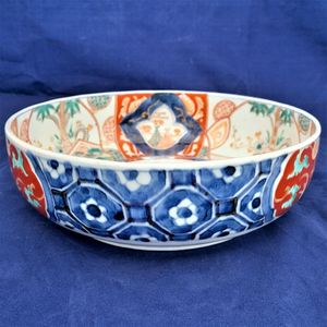left side kikko  - Japanese Arita porcelain Imari pattern Bowl with Central Kirin & garden scenes - the base with double foot ring - antique late Edo period 19th C