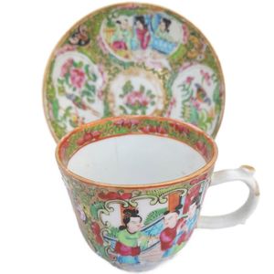 Cup with saucer on a stand