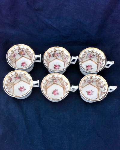 Set of six antique John and William Ridgway porcelain coffee cans or cups decorated with a hand painted floral pattern in the Fluted Old English or Royal shape circa 1825.