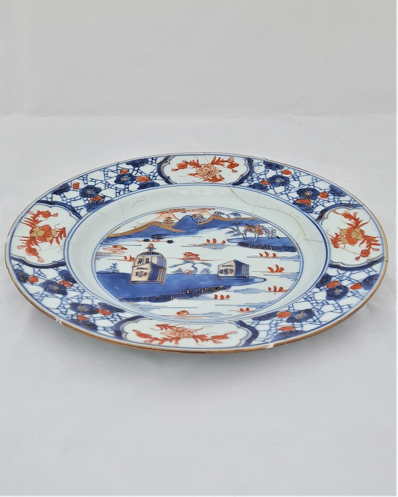 An antique Chinese Kangxi Porcelain Plate Painted European Style Buildings circa 1720 As found  twelve pieces glued back together.