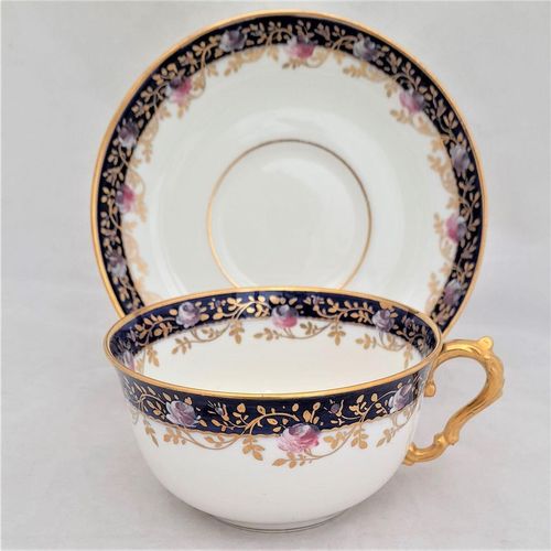 Right view - Antique porcelain tea cup & saucer hand painted blue rim & swagged pink roses by W. Lambert 1915 - Larcombe King St Derby on a Bishop & Stonier Blank