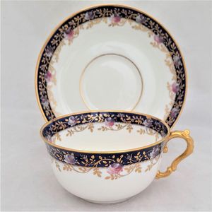 Right view - Antique porcelain tea cup & saucer hand painted blue rim & swagged pink roses by W. Lambert 1915 - Larcombe King St Derby on a Bishop & Stonier Blank