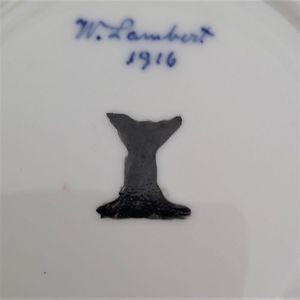 close up of mark - Antique porcelain tea cup & saucer hand painted blue rim & swagged pink roses by W. Lambert 1915 - Larcombe King St Derby on a Bishop & Stonier Blank