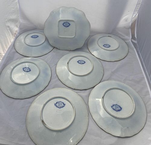 underside of all seven plates