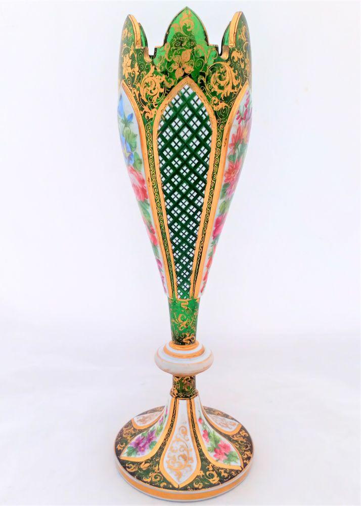 An Antique Bohemian Cut Green Glass Vase with Petal Shaped Overlay Panels that are Cut Enamelled and Gilded made by Josephinehutte in Schreiberhau Silesia circa 1865