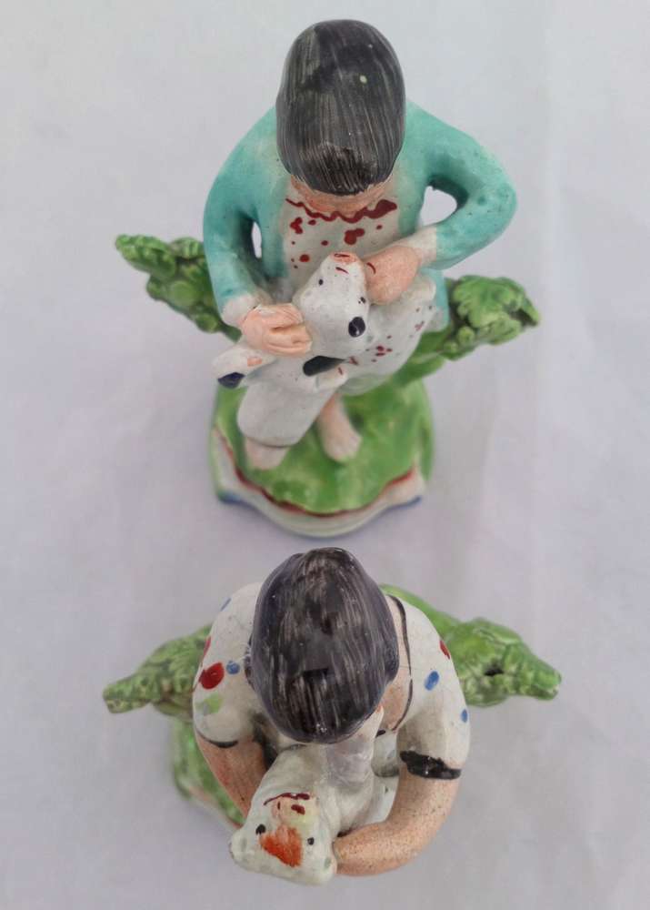 Antique Pair of Enamelled Pearlware Sherratt Style Bocage Figurines of Shepherd with Dog and Shepherdess with lamb circa 1820