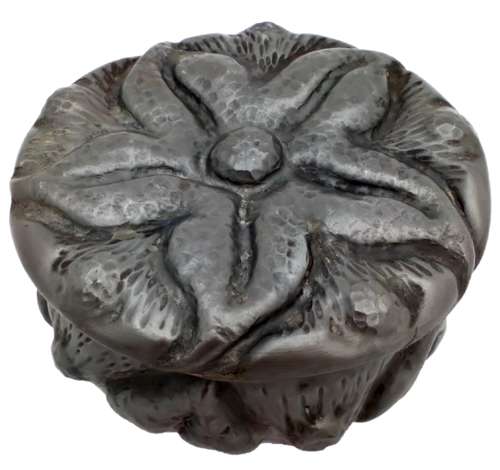 An antique French Art Nouveau Repousse Pewter Box with stylised five pointed flower by Alice & Eugene Louis Chanal circa 1910