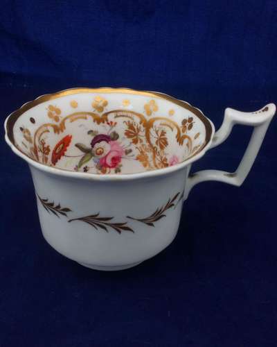 Set of six antique John and William Ridgway porcelain coffee cans or cups decorated with a hand painted floral pattern in the Fluted Old English or Royal shape circa 1825.