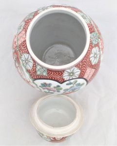 A large antique Japanese Hizen porcelain vase and cover marked Zoshuntei Saiho. Decorated in hand painted enamels with two large Japanese folding fans each painted with a colourful Asiatic Pheasant flying over a Japanese Acer.  This antique temple vase and cover dates from the mid 19th century circa 1860.