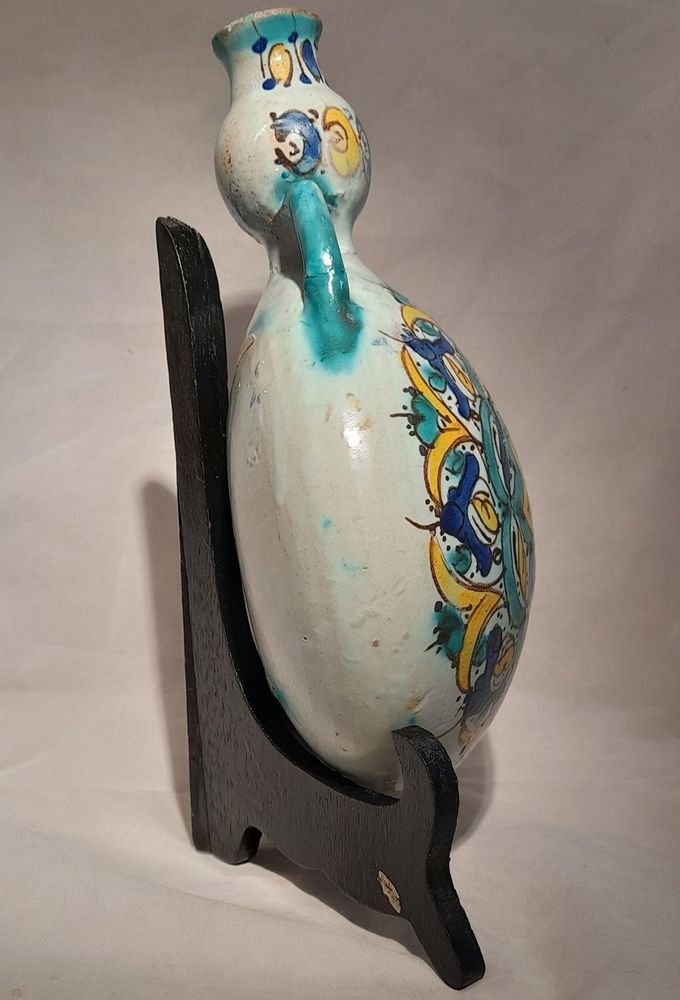 Moroccan tin glazed earthenware or faience pilgrim water flask antique 19th century hand painted with polychrome Arabesque foliate geometric pattern  727 grammes  9 inches long 6.5 inches wide  3 5/8 inches deep